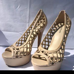 Latticed gold studded platform heel